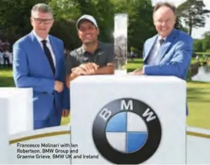  ??  ?? Francesco Molinari with Ian Robertson, BMW Group and Graeme Grieve, BMW UK and Ireland