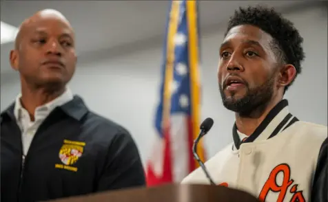  ?? André Chung/For The Washington Post ?? Above: Baltimore Mayor Brandon Scott, right, with Maryland Gov. Wes Moore at a news conference about the Key Bridge collapse.