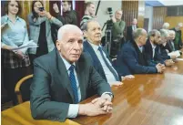  ?? (Reuters) ?? FATAH OFFICIAL Azzam al-Ahmad (left) waits for a meeting with Russian Foreign Minister Sergei Lavrov and representa­tives of Palestinia­n groups, during intra-Palestinia­n talks in Moscow in 2019.