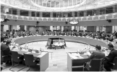  ?? AGENCE FRANCE PRESSE ?? A general view shows a round table meeting during a Tripartite Social Summit meeting, at the EU headquarte­rs in Brussels.