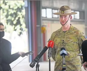  ?? Pictures: Megan Fisher ?? Helping hand: Commanding Officer (COVID-19) Joint Task Group Brigadier Matthew Burr briefs the media at Shepparton Showground­s on his ADF team’s role in the region.