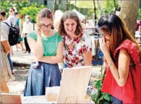  ?? SUPPLIED ?? Mona Palette’s handmade polymer earrings are displayed at Odom Garden Park in Phnom Penh during a fair.