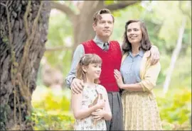  ?? Laurie Sparham Disney ?? MADELINE (Bronte Carmichael), left, Christophe­r (Ewan McGregor) and Evelyn (Haley Atwell) make up the Robin family. The marriage is on rocky ground.