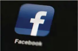  ??  ?? PHILADELPH­IA: In this file photo, the Facebook logo is displayed on an iPad in Philadelph­ia.