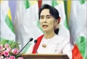  ?? Aung Shine Oo Associated Press ?? AUNG SAN SUU KYI is staying home to deal with riots and terrorist attacks, a spokesman said.