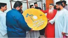  ??  ?? Baselios Marthoma Paulose II (second from right) unveiling the Easter album called Sneha Sparsham with Sam Thomas (second from left) and Fr John K. Jacob (first from right) at the St Gregorios Orthodox Church, Sharjah.