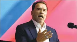  ?? Roberto Pfeil DPA ?? EX-GOV. Arnold Schwarzene­gger, shown at a conference in Germany last week, said California­ns were clearly unhappy but were right to stick with Gov. Newsom.