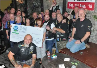  ??  ?? Organisers and friends of the Mick O’Regan Memorial Run, which this year raised more than €30,000 for Pieta House, at the cheque presntatio­n ceremony in Kit Roche’s, Buttevant.