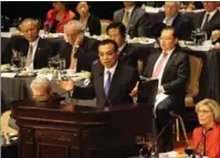  ?? HONG XIAO / CHINA DAILY ?? Premier Li Keqiang delivers a speech at the gala dinner co-hosted by the Economic Club of New York at the Waldorf Astoria New York hotel in New York on Tuesday.