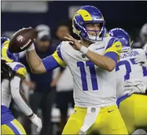  ?? MICHAEL AINSWORTH — THE ASSOCIATED PRESS ?? Rams QB Brett Rypien, shown passing at Dallas last week, may start today at Green Bay with Matthew Stafford dealing with a sprained right thumb.