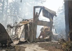  ??  ?? This was all that was left of a burned-out and collapsed house on Mount Veeder Road after flames from the Nuns Fire moved through the Napa Valley last October.