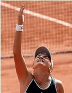  ??  ?? Barbora Krejcikova looks skyward after winning the French Open, a victory inspired by the memory of her late coach, Jana Novotna.