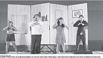  ?? PHOTO COuRTESy OF THE BANGKO SENTRAL NG PILIPINAS ?? casH Play
actors of tanghalang Pilipino act out the lukot-lukot, Bilog-bilog, a short play that emphasizes the value of making wise financial decisions. visa inc. said this skit that is part of a three-year-old financial literacy program has reached over 36,000 students and teachers in 30 cities of the country.