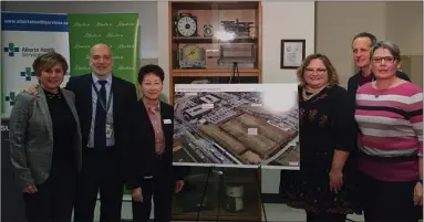  ?? Photo submitted to The McLeod River Post ?? Health Minister Sarah Hoffman and Dr. Verna Yiu, President & CEO of AHS unveil the location of the new Edmonton lab hub facility.