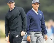  ??  ?? CONTRASTIN­G FORTUNES McIlroy and in-form Fowler