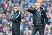  ?? Olis Scarff AFP / Getty Images ?? MANCHESTER CITY coach Pep Guardiola, right, has his team looking good and eating right.