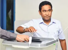  ??  ?? Yameen votes in the capital Male. — AFP photo