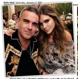  ??  ?? She’s the one: Robbie WIlliams and wife Ayda Field