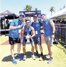 ?? CONTRIBUTE­D PHOTOS ?? Cebuano multi-sport racer Afshin Ghassemi joyfully crosses the finish line after conquering the tough Ironman 70.3 Puerto Rico over the weekend. The other photo shows Ghassemi together with Ironman XC executives Troy Theodosiou, Troy Ford, and Logan.
