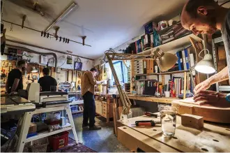  ?? ?? A collective of guitarmaki­ng students get to work on their fromscratc­h acoustic builds in Alex’s Bristol workshop