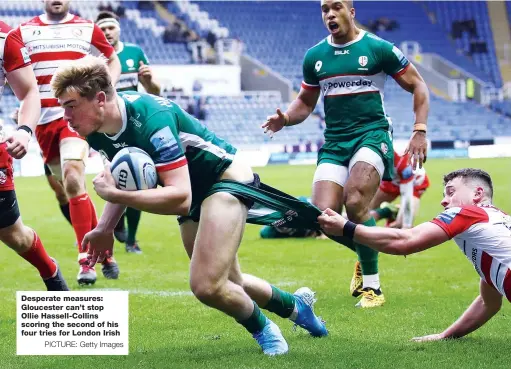  ?? PICTURE: Getty Images ?? Desperate measures: Gloucester can’t stop Ollie Hassell-Collins scoring the second of his four tries for London Irish