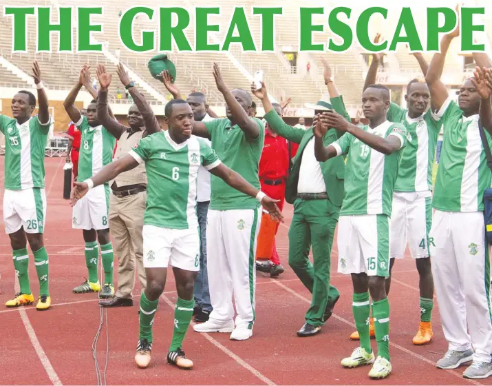  ?? (Picture by Kudakwashe Hunda) ?? THE GREEN FAMILY ... CAPS United defender Hardlife Zvirekwi (No.6) leads his teammates and members of the coaching staff in saluting fans after their dramatic comeback against bitter rivals Dynamos in a Castle Lager Premiershi­p soccer match at the National Sports Stadium yesterday.