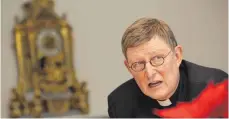  ?? FOTO: DPA ?? Kardinal Woelki ist überzeugt, dass der Familienna­chzug von Flüchtling­en den sozialen Frieden in Deutschlan­d fördern würde.