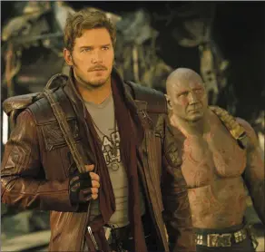  ??  ?? Chris Pratt as Star-Lord/Peter Quill and Dave Bautista as Drax in