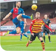  ??  ?? Sean Welsh in action against Partick’s Craig Slater