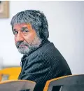  ?? CHANCEY BUSH/THE ASSOCIATED PRESS ?? Muhammad Syed looks over his shoulder during closing arguments at the Bernalillo County Courthouse in Albuquerqu­e on Friday.