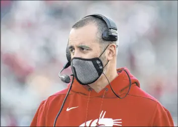  ?? Young Kwak The Associated Press ?? Nick Rolovich was fired Monday as Washington State football coach for failing to comply with the state’s vaccine mandate.