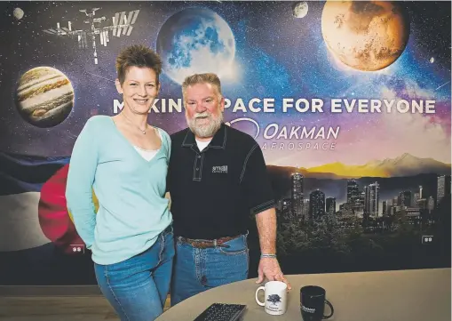  ?? Kathryn Scott, Special to The Denver Post ?? Maureen O’brien, chief executive officer for Oakman Aerospace Inc., poses with Stanley Kennedy Jr., president and chief systems engineer, at the company’s headquarte­rs April 17. Oakman Aerospace is based in Highlands Ranch.