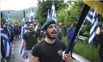  ?? AP ?? Opponents of the deal protest at the village of Pisoderi, Prespes near the border with Macedonia in northern Greece. —