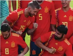  ??  ?? Watch out: Ramos (left) teases Spanish team-mate Costa