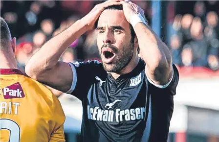  ??  ?? It’s been all-too-regular this season to see a Dundee striker holding their head after a chance goes begging.