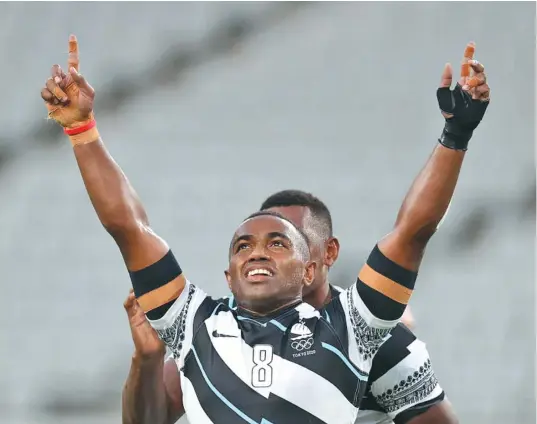  ?? Photo: World Rugby ?? Team Fiji men’’s rugby sevens playmaker Waisea Nacuqu gives his victory salute after beating New Zealand 27-12 in the gold medal of the Tokyo 2020 Olympic Games final in Japan on July 28, 2021.