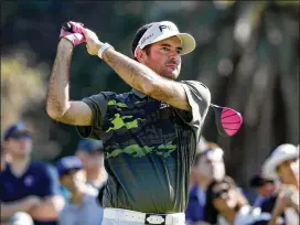  ?? CHRISTIAN PETERSEN / GETTY IMAGES ?? Bubba Watson drives from the second tee during the third round of the Genesis Open. He made a par 4 on the hole and leads with a 10-under 203.