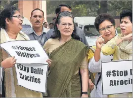  ?? PTI PHOTO ?? Former Congress president Sonia Gandhi with Opposition party members during a protest in Parliament during the budget session in New Delhi on Thursday.