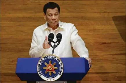  ?? REUTERS PIC ?? Philippine President Rodrigo Duterte delivering his State of the Nation address at the House of Representa­tives in Quezon city, Manila, last week. Duterte, the first Filipino president from Mindanao, created history anew with signing of the BOL.