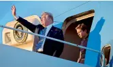  ??  ?? US President Donald Trump and Barron Trump arrive at Palm Beach Internatio­nal Airport on Saturday.—AP