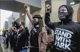  ??  ?? SILENT BACKERS join the march marking Cannon’s return to the Statehouse in Atlanta on Monday for the first time since her protest and arrest last week.