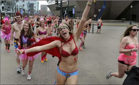  ?? DENVER POST FILE ?? Hundreds of underwear-clad runners made their way downtown and around Civic Center Park in the Cupid’s Undie Run in February 2017.