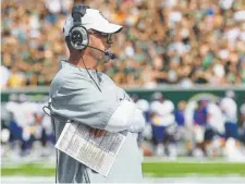  ?? Austin Humphreys, Special to The Denver Post ?? CSU coach Mike Bobo has the full support of athletic director Joe Parker.