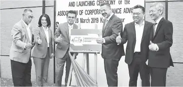  ??  ?? (From left) Yoke Nyen, Muh Rong, Wan Asmadi, Muhammad Umar, Feizal and Siow at ACFA’s launch ceremony on Thusday.