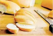  ??  ?? Mexican bolillos, soft sandwich rolls or a loaf of French bread all work great in capirotada. Slice enough bread for three layers.