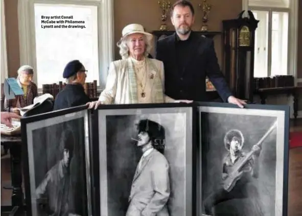  ??  ?? Bray artist Conall McCabe with Philomena Lynott and the drawings.