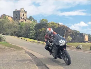  ?? ?? ON THE ROAD: Stevie Henderson wearing the motorbike gear that was stolen.