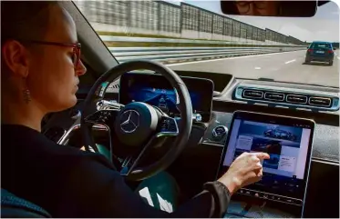  ??  ?? HANDS-OFF Level 3 semiautono­mous driving tech will give ‘hands-off’ facility on motorways and in traffic jams, so driver can check E-mails or browse the web