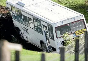  ?? ANDY JACKSON/STUFF ?? This bus crash near Inglewood is one of three under scrutiny in an investigat­ion ordered by the Government but there are moves to put the entire industry under the microscope.