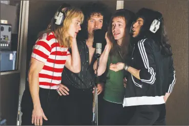  ?? Alex Bailey/Twentieth Century Fox ?? From left, the rock band Queen – Ben Hardy (Roger Taylor), Gwilym Lee (Brian May), Joe Mazzello (John Deacon), and Rami Malek (Freddie Mercury) – in “Bohemian Rhapsody.”